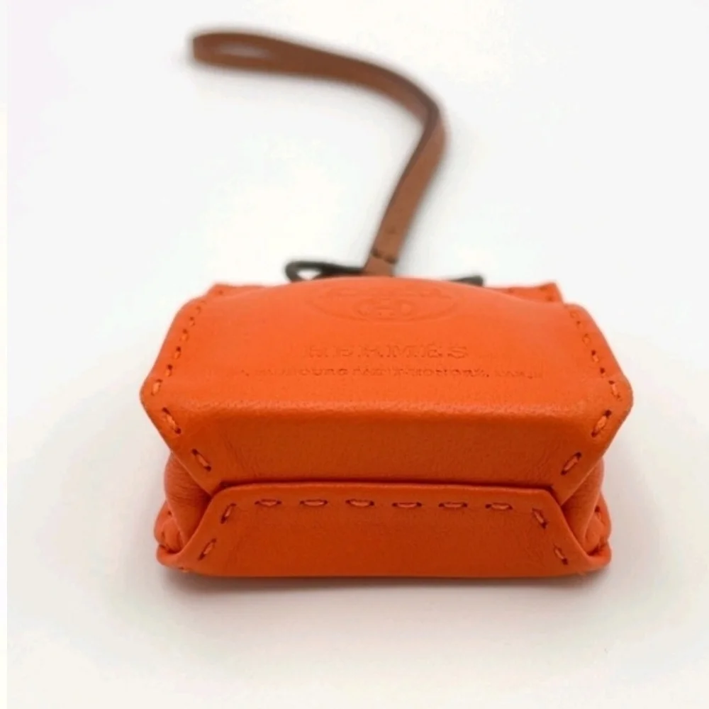 HERMÈS ORANGE LEATHER MINI POUCH BAG CHARM KEY HOLDER + BOX - Picture 8 of 12